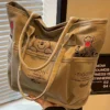 Winnie The Pooh Printed Canvas Tote Bag Retro Shoulder Bag Large Capacity Multi Pocket Light Handbag Student Commuter Bag